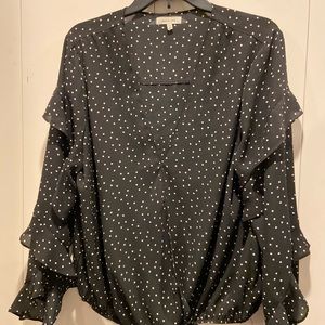 Polka dot faux wrap shirt